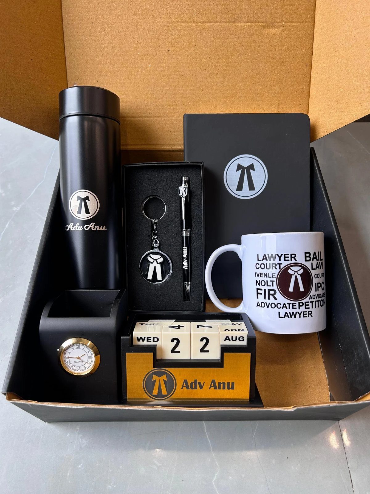 Personalized lawyer gift set with black accessories and a white themed mug.
