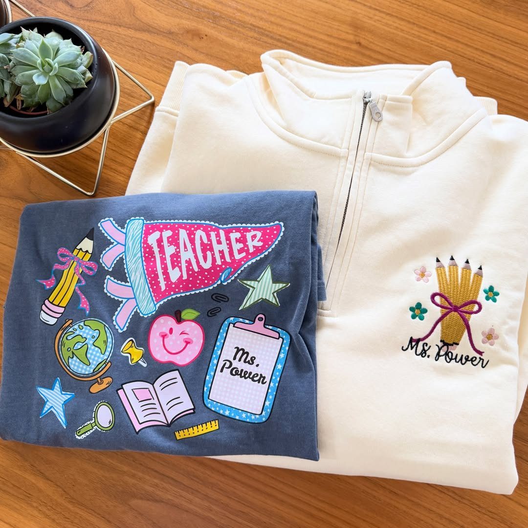 Custom teacher shirts including a navy t-shirt and cream pullover with personalized names.